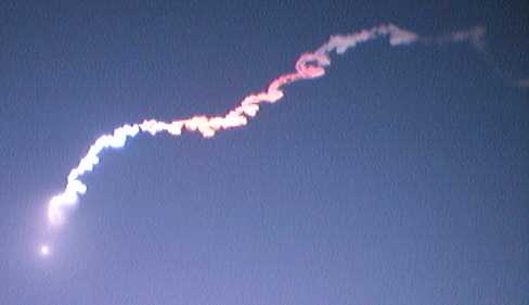 Third stage, above the atmosphere, exhaust trail color intensifies...(by Ron Rhrenbacher