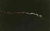 Photo of M-II launch, windblown exhaust (by Jean Noel)