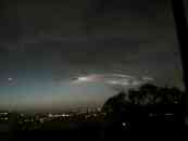 Rainbow exhaust trail, copyright 2002 by Gina Pisello